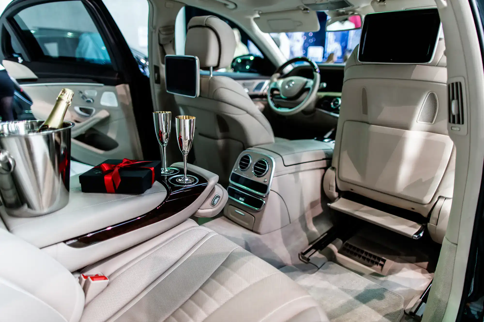 Interior of a luxurious wedding limousine in Philadelphia County, PA, featuring plush leather seating, ambient lighting, elegant décor, and spacious comfort for a stylish, memorable ride