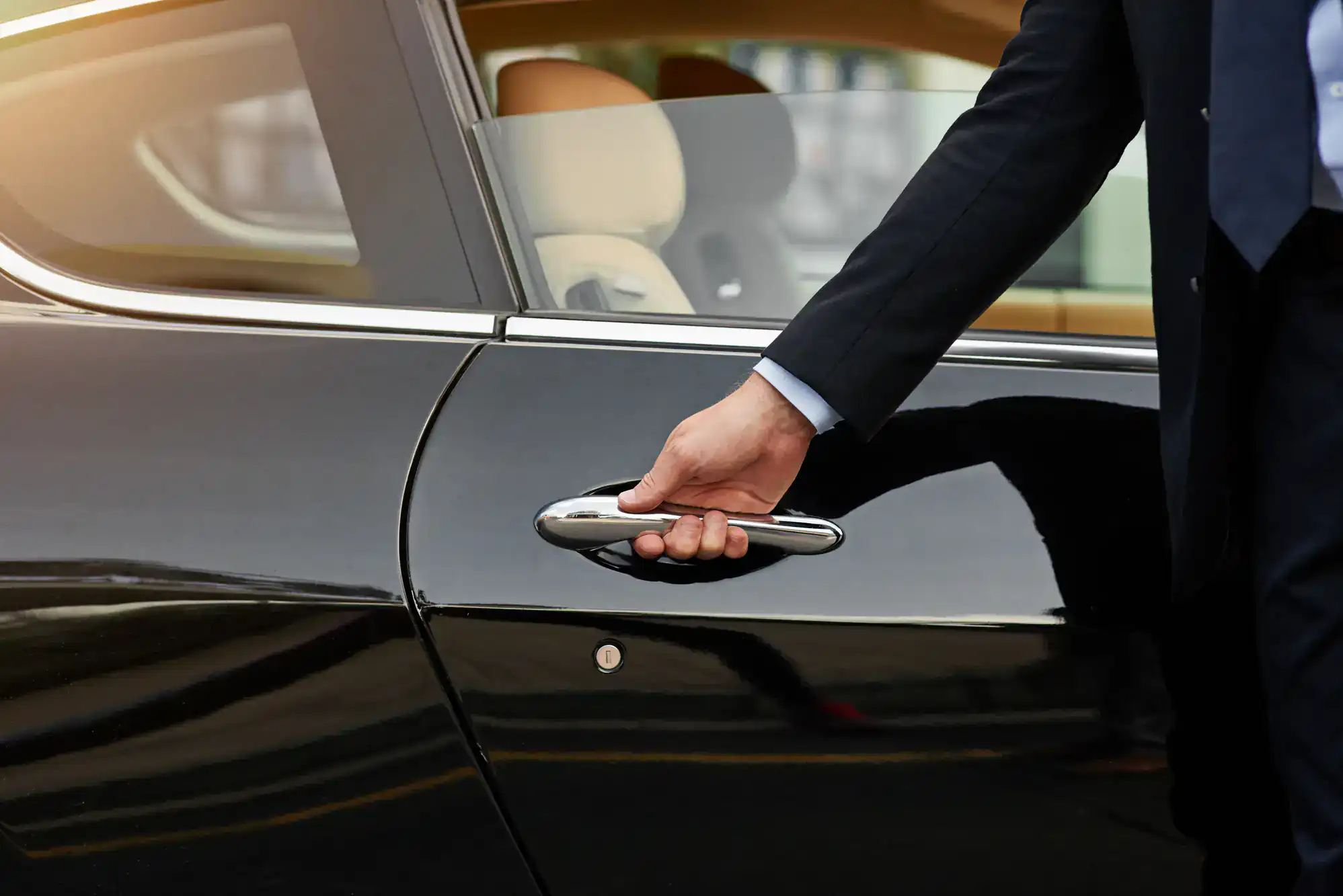 Close-up of a sleek luxury car door handle with polished chrome finish, highlighting premium craftsmanship, elegance, and attention to detail in Philadelphia County, PA