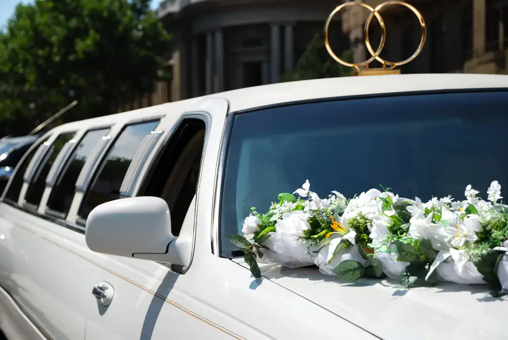 Elegant wedding limo with beautiful floral decor, offering luxurious transportation for your special day in Philadelphia County, Pennsylvania with Philadelphia Car and Limo